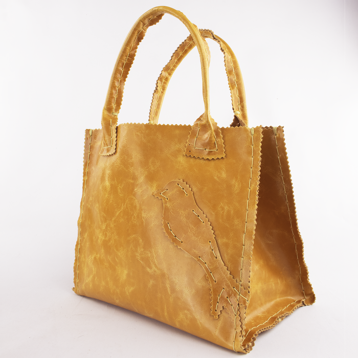 Distressed Honey Brown Leather Tote with Bird Motif.