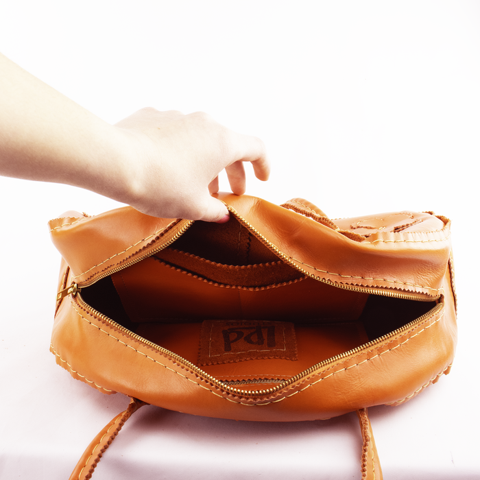 Orange Half Moon Handbag with Sprinkled Floral Design