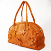 Orange Half Moon Handbag with Sprinkled Floral Design