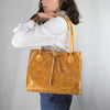 Distressed Honey Brown Leather Bag with Mirrored Bird Motif