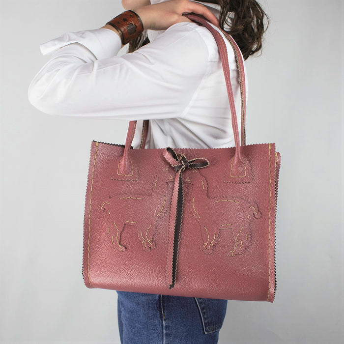 Salmon Pink Leather Handbag with a Silver Shimmer and Handcut with Llama's