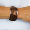Hand Forged Copper Cuff with Distressed Leather and Flowers