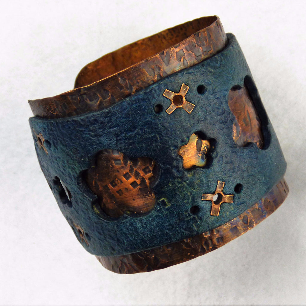Distressed Copper Leather Cuff with Floral Cut Outs and Hand Cut Rivets